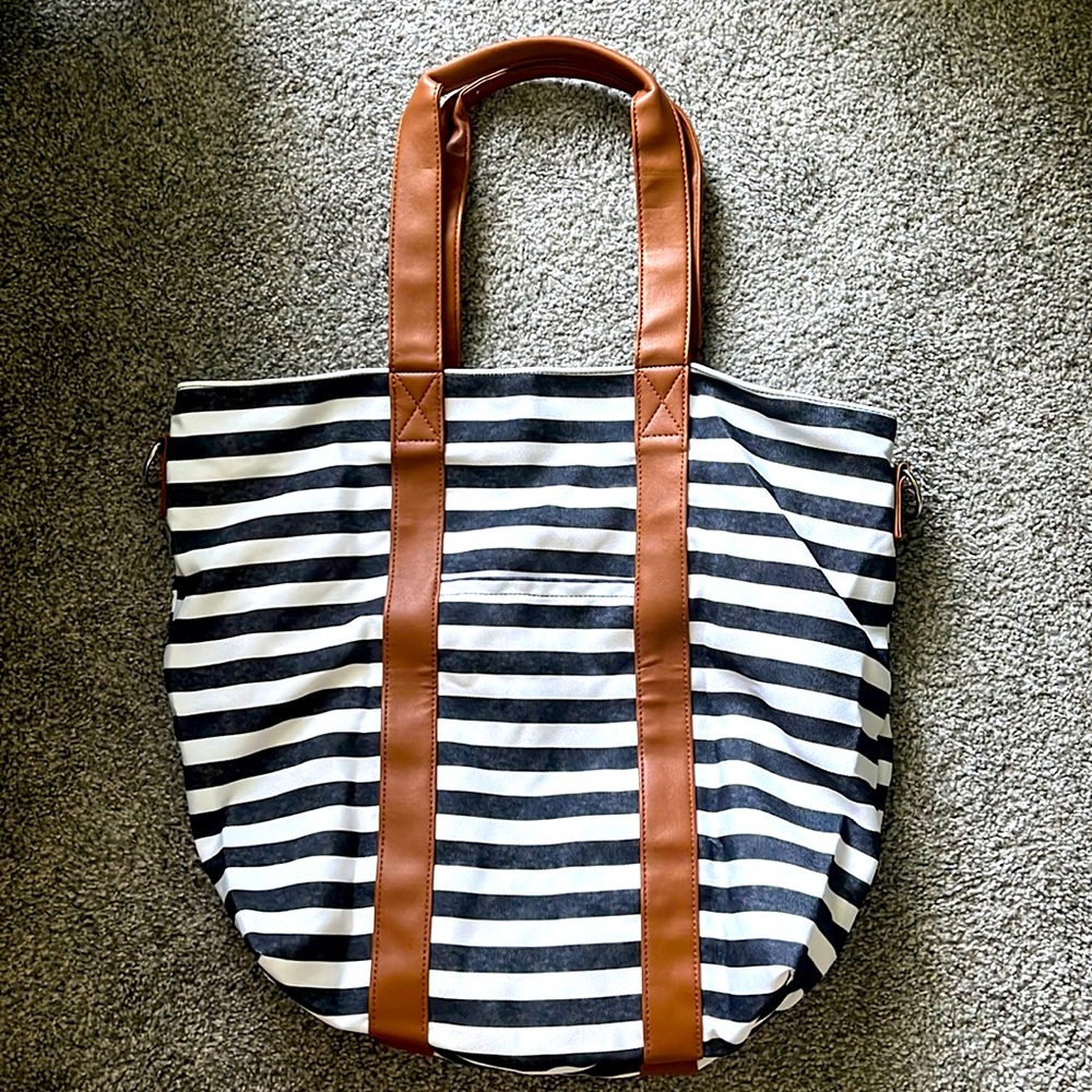 Navy and white stripped tote with tan faux leather straps
